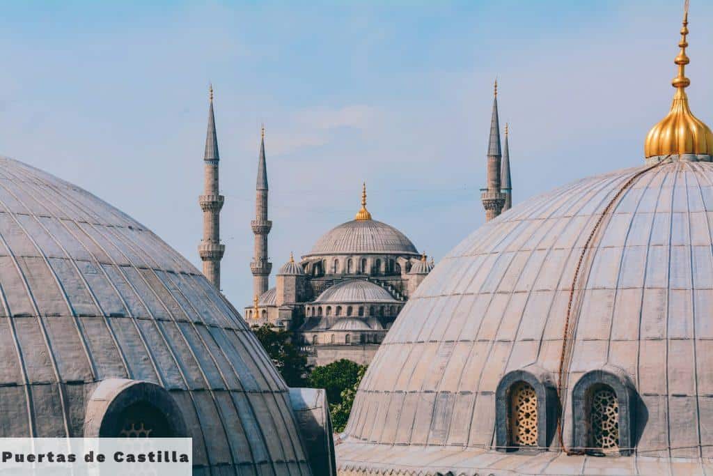 a group of domes with a sky background