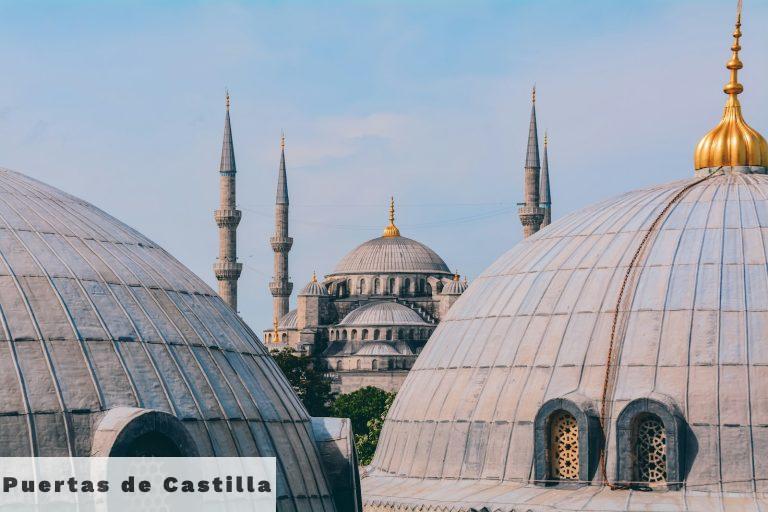 a group of domes with a sky background