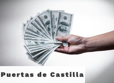 person holding 100 US Dollar banknote